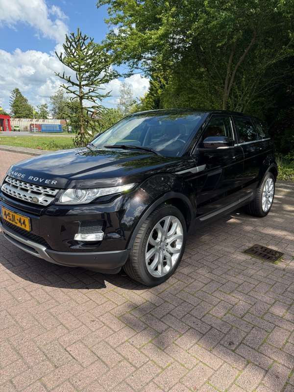 Zwart Gebruikt 2013 Land Rover Range Rover evoque Prestige Stationwagen | € 13.990 (Eerlijke prijs) - Afbeelding 1/4