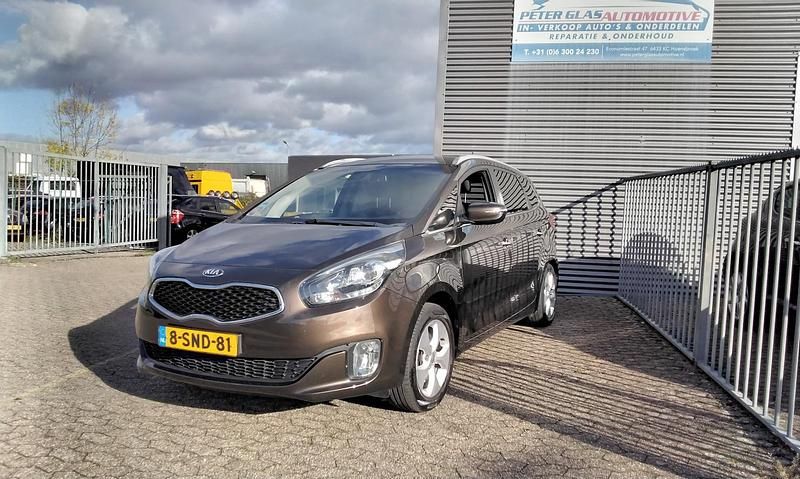 Bruin (parellak) Gebruikt 2014 Kia Carens MPV | € 8.499 (Goede deal) - Afbeelding 1/4