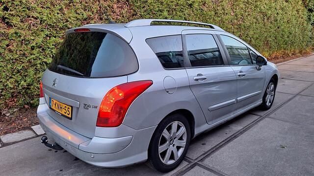 Occasion Peugeot 308 SW 114 PK (83 kW) 2013 Grijs Stationwagen