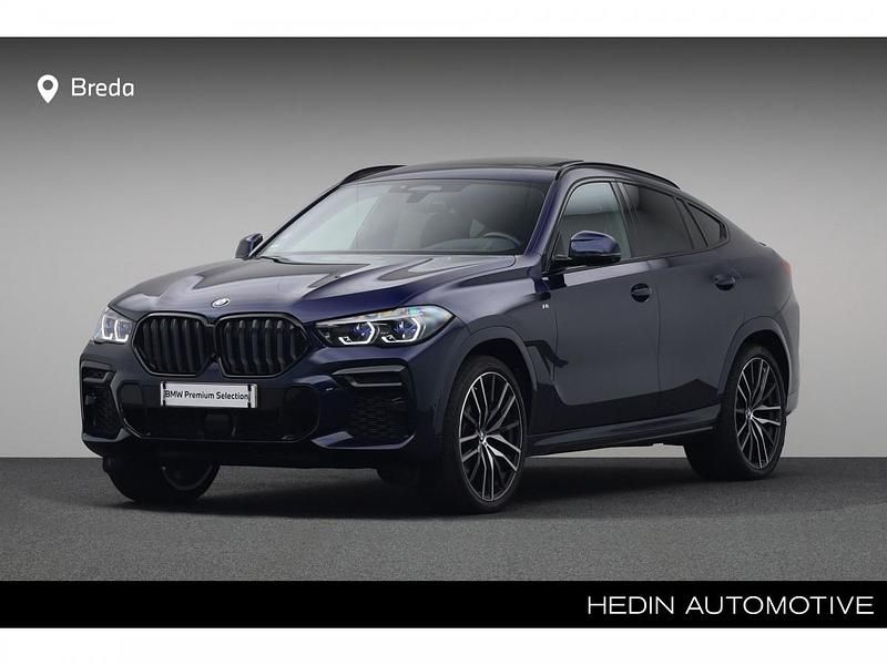 Bmw individual tansanit metallic (donker blauw metallic) Gebruikt 2022 BMW X6 Comfort Edition SUV | € 85.880 - Afbeelding 1/4