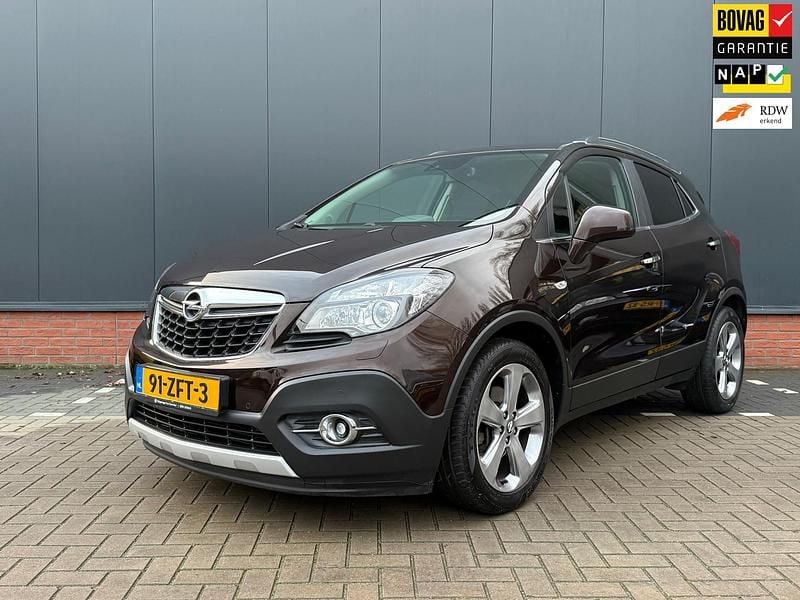 Bruin Gebruikt 2012 Opel Mokka Cosmo SUV | € 7.995 (Eerlijke prijs) - Afbeelding 1/4