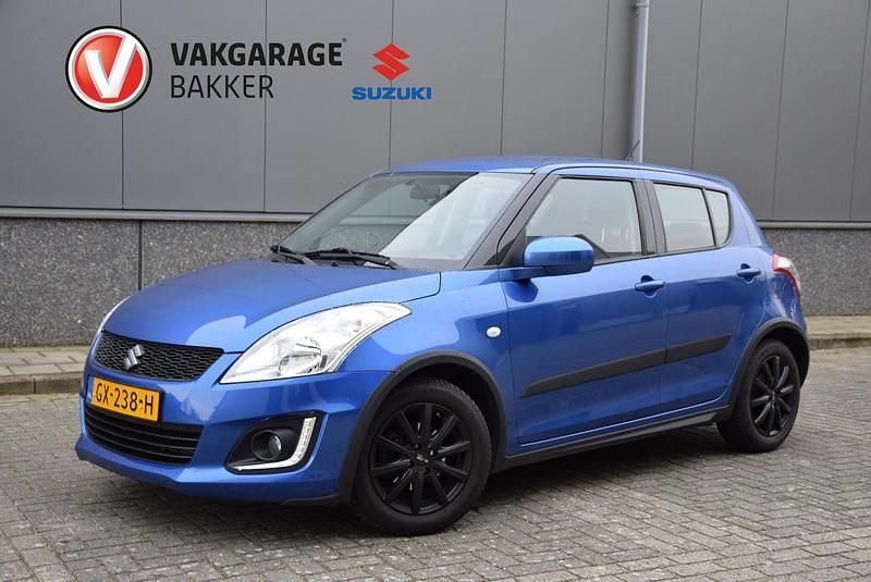 Blauw Occasion 2015 Suzuki Swift Hatchback | € 11.500 (Eerlijke prijs) - Afbeelding 1/4