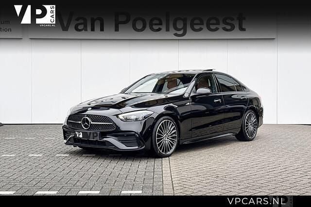 Zwart Occasion 2024 Mercedes C200 AMG line Sedan | € 59.900 - Afbeelding 1/4