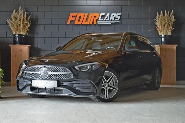 Zwart, metallic lak Gebruikt 2021 Mercedes C200 AMG line Stationwagen | € 42.250 (Eerlijke prijs) - Afbeelding 1/4