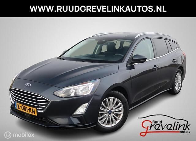 Blauw (metallic) Occasion 2021 Ford Focus Titanium Stationwagen | € 12.495 (Eerlijke prijs) - Afbeelding 1/4