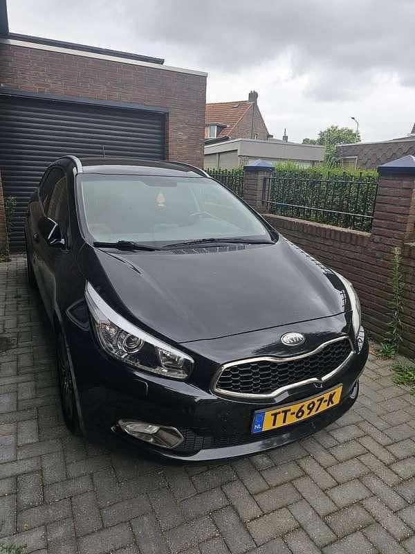 Zwart Gebruikt 2013 Kia Ceed Stationwagen | € 3.500 (Super prijs) - Afbeelding 1/4