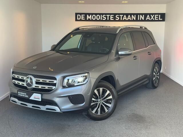 Grijs, metallic lak Gebruikt 2022 Mercedes GLB180 Business SUV | € 37.950 (Super prijs) - Afbeelding 1/3
