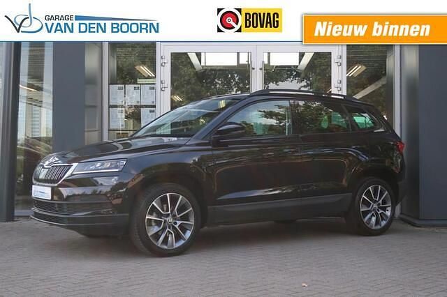 Zwart Gebruikt 2021 Skoda Karoq SUV | € 28.950 (Eerlijke prijs) - Afbeelding 1/4