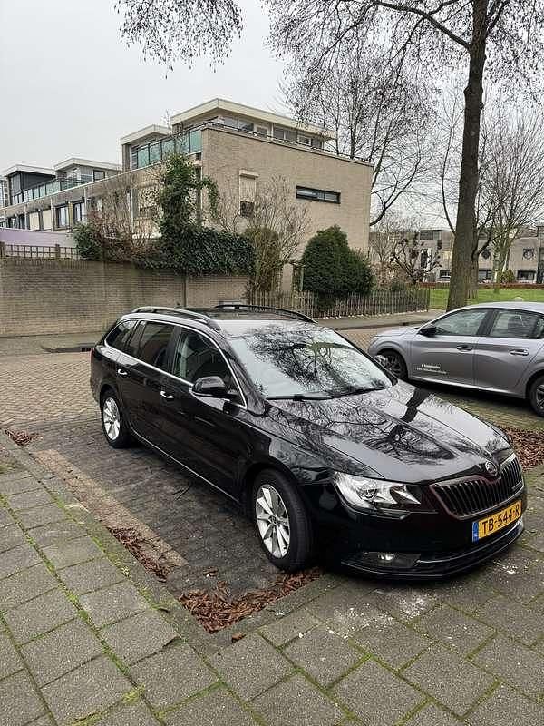 Occasion Skoda Superb Ambition 105 PK (77 kW) 2014 Zwart Stationwagen