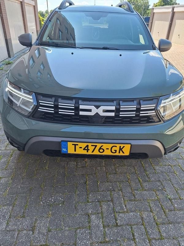 Grijs Gebruikt 2023 Dacia Duster Journey SUV | € 26.840 (Eerlijke prijs) - Afbeelding 1/3