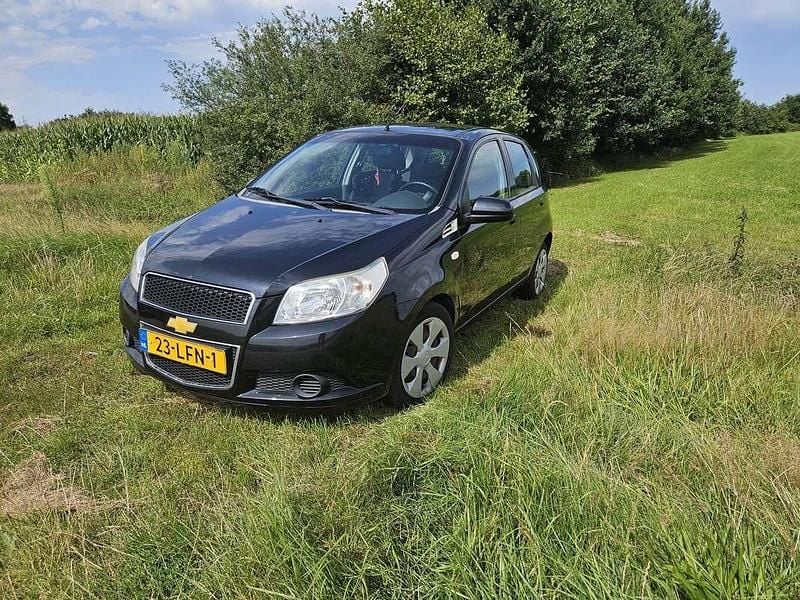 Zwart Gebruikt 2010 Chevrolet Aveo LS Hatchback | € 899 (Goede deal) - Afbeelding 1/4