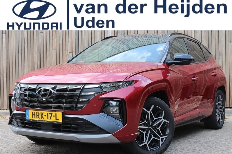 Sunset red tt (rood parelmoer) Gebruikt 2022 Hyundai Tucson N Line SUV | € 34.950 (Eerlijke prijs) - Afbeelding 1/4