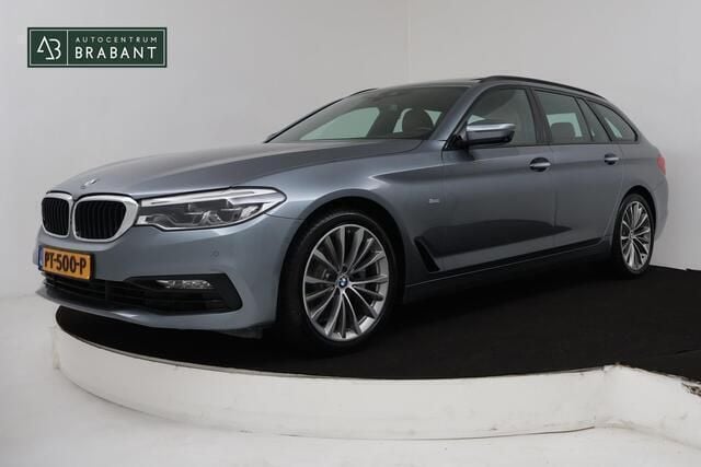 Grijs Gebruikt 2017 BMW 520 Executive Stationwagen | € 21.945 (Goede deal) - Afbeelding 1/4