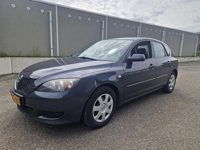 Grijs Gebruikt 2006 Mazda 3 Touring Hatchback | € 3.950 (Eerlijke prijs) - Afbeelding 1/4