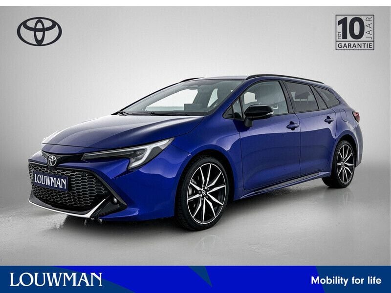 Blauw Gebruikt 2023 Toyota Corolla Hybrid Sport Stationwagen | € 32.450 - Afbeelding 1/3