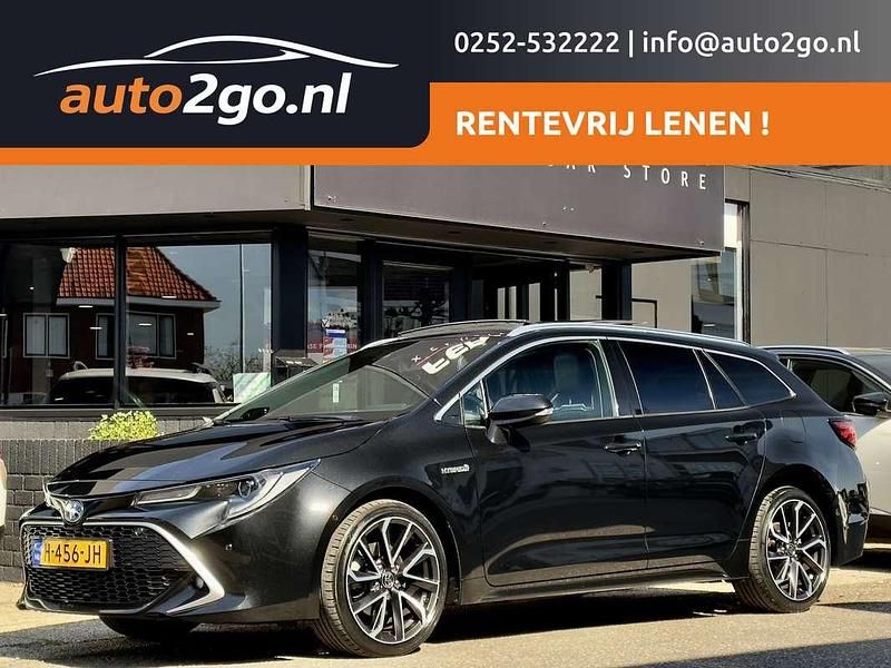 Zwart (metallic) Occasion 2020 Toyota Corolla Premium Stationwagen | € 15.900 - Afbeelding 1/4