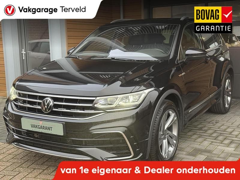 Zwart Occasion 2023 VW Tiguan R-line SUV | € 40.749 (Super prijs) - Afbeelding 1/4