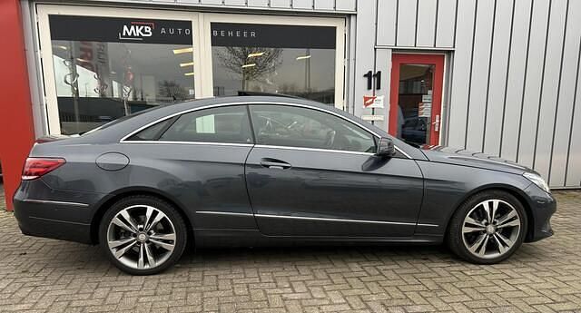 Grijs Gebruikt 2015 Mercedes E350 Prestige Coupé | € 16.950 - Afbeelding 1/4