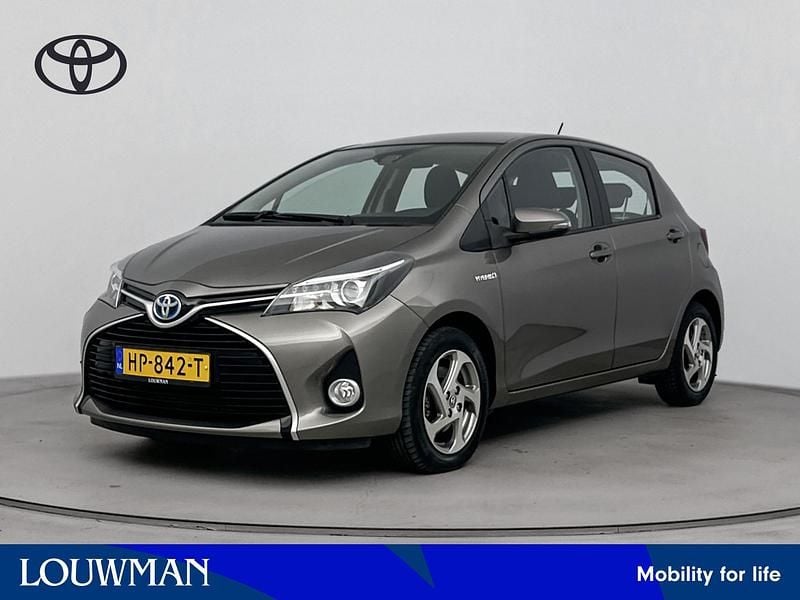 Grijs Gebruikt 2015 Toyota Yaris Hybrid Trend Hatchback | € 13.745 (Eerlijke prijs) - Afbeelding 1/4
