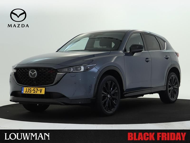 Grijs metallic Gebruikt 2022 Mazda CX-5 Homura-Line SUV | € 35.335 (Eerlijke prijs) - Afbeelding 1/4