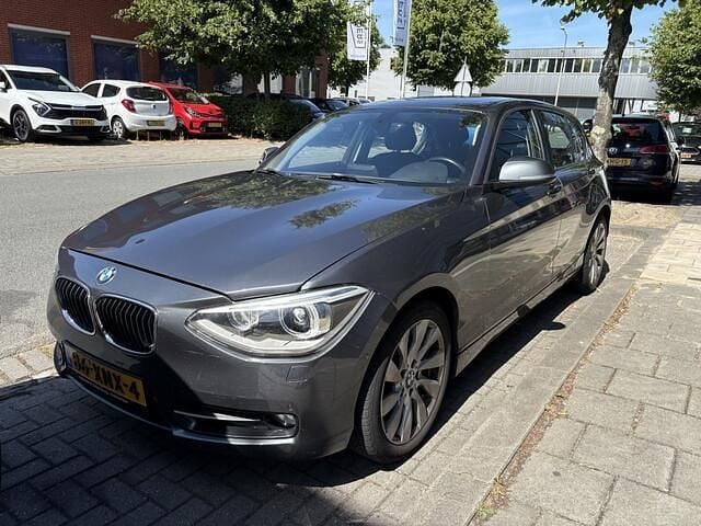 Grijs Gebruikt 2012 BMW 118 Hatchback | € 5.849 (Iets duurder) - Afbeelding 1/4