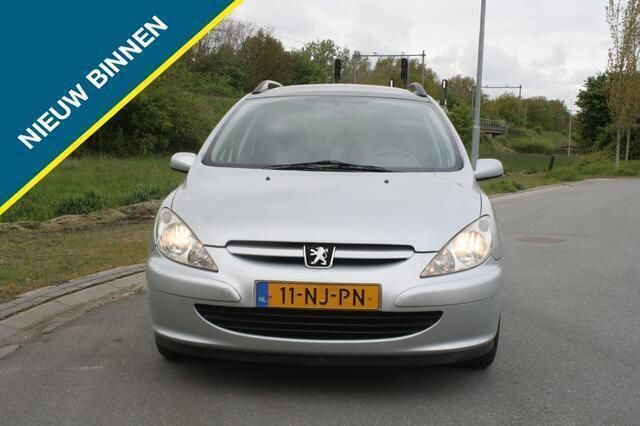 Grijs Gebruikt 2003 Peugeot 307 Stationwagen | € 1.249 (Eerlijke prijs) - Afbeelding 1/4