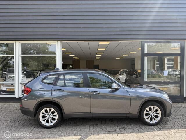 Grijs Gebruikt 2013 BMW X1 SUV | € 11.500 (Eerlijke prijs) - Afbeelding 1/4