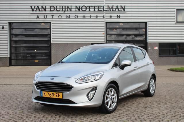Grijs Gebruikt 2021 Ford Fiesta Titanium Hatchback | € 15.950 (Eerlijke prijs) - Afbeelding 1/4