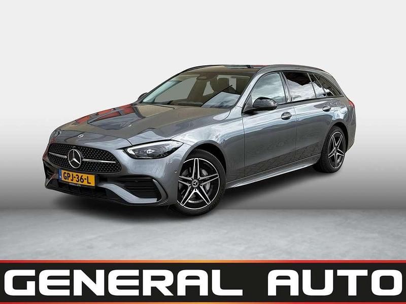 Grijs, metallic lak Gebruikt 2023 Mercedes C300e Luxury Stationwagen | € 39.950 (Super prijs) - Afbeelding 1/4