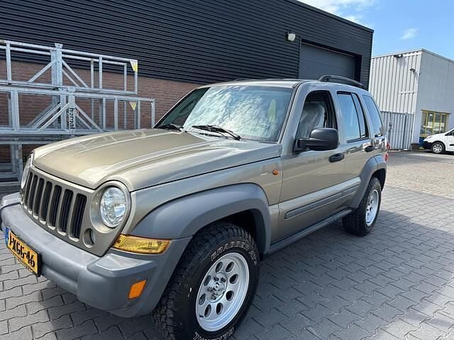 Bruin Gebruikt 2005 Jeep Cherokee Sport SUV | € 3.990 (Goede deal) - Afbeelding 1/4