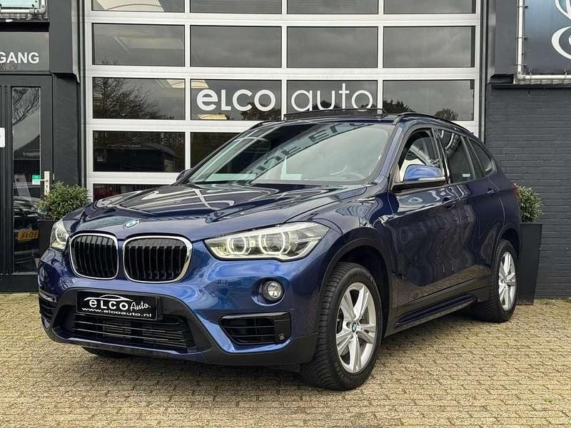 Blauw (metallic) Gebruikt 2018 BMW X1 Executive SUV | € 18.950 (Goede deal) - Afbeelding 1/4