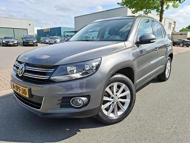 Grijs Gebruikt 2012 VW Tiguan Sport SUV | € 8.950 (Goede deal) - Afbeelding 1/4