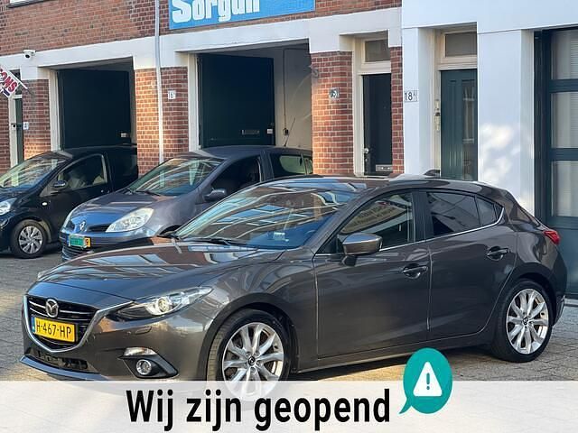 Bruin Gebruikt 2015 Mazda 3 Hatchback | € 7.500 (Goede deal) - Afbeelding 1/4