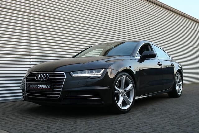Grijs Gebruikt 2014 Audi A7 Sportback Proline Hatchback | € 28.950 - Afbeelding 1/4