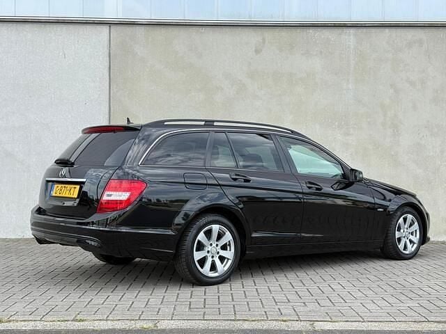 Occasion Mercedes C180 Elegance 157 PK (115 kW) 2011 Zwart, metallic lak Stationwagen