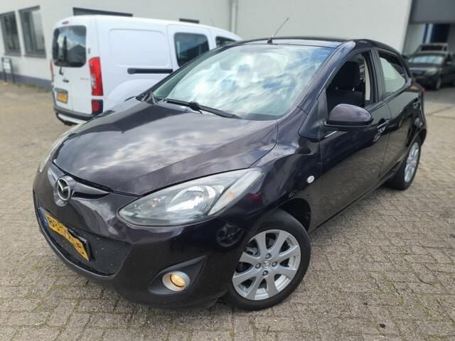 Bruin Gebruikt 2011 Mazda 2 Hatchback | € 1.250 - Afbeelding 1/4