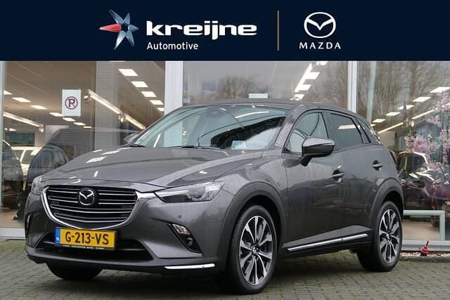 Machine gray Gebruikt 2019 Mazda CX-3 SUV | € 21.925 (Eerlijke prijs) - Afbeelding 1/4
