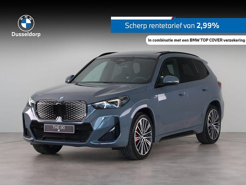 Grijs, metallic lak Gebruikt 2025 BMW iX1 Comfort Edition SUV | € 46.950 - Afbeelding 1/4