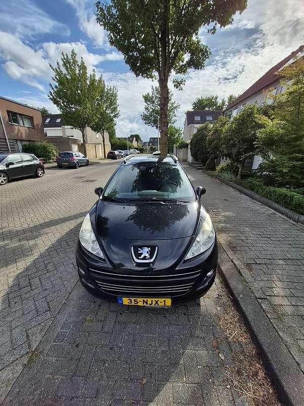 Zwart Gebruikt 2010 Peugeot 207 Stationwagen | € 2.199 (Super prijs) - Afbeelding 1/4