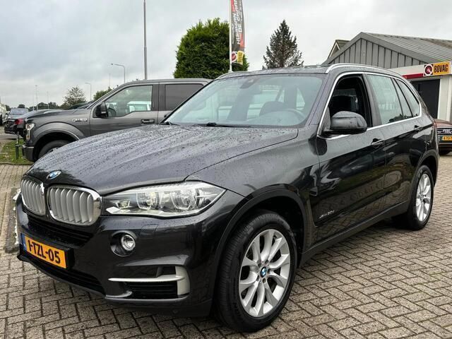 Grijs Gebruikt 2014 BMW X5 SUV | € 29.950 (Eerlijke prijs) - Afbeelding 1/4