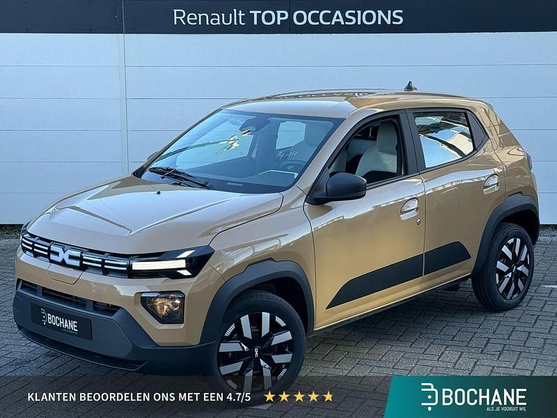 Bruin Nieuw 2025 Dacia Spring Expression Hatchback | € 19.325 - Afbeelding 1/4