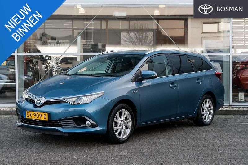 Blauw Occasion 2018 Toyota Auris Hybrid Hatchback | € 18.950 (Eerlijke prijs) - Afbeelding 1/4