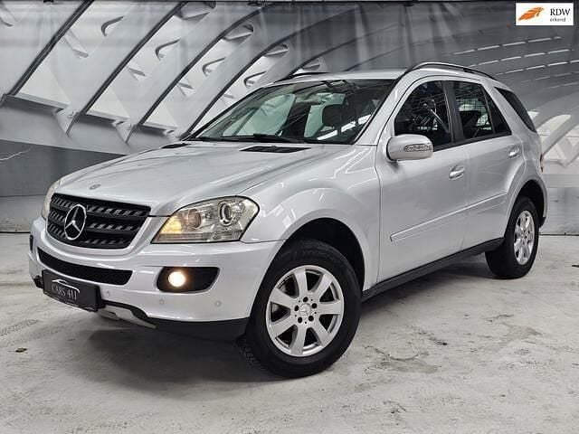 Grijs (metallic) Gebruikt 2006 Mercedes 280 SUV | € 5.499 (Super prijs) - Afbeelding 1/4