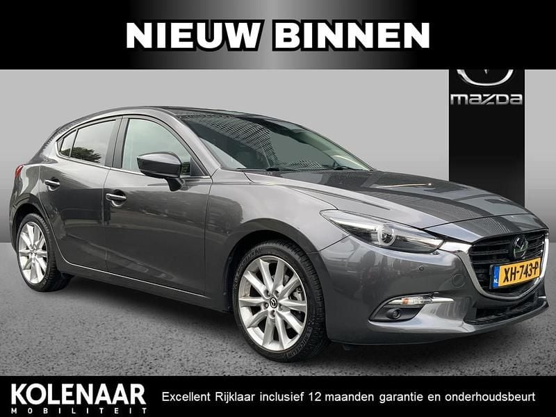 Machine gray Gebruikt 2019 Mazda 3 Hatchback | € 21.895 (Goede deal) - Afbeelding 1/4