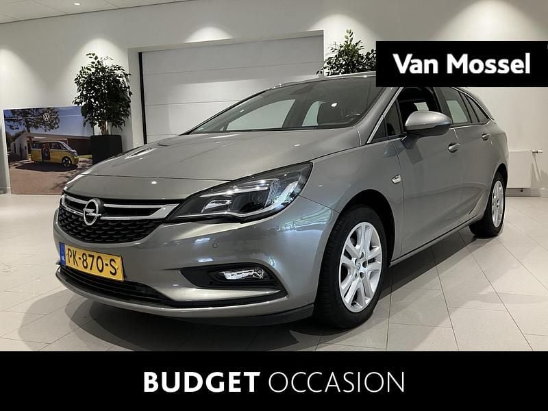 Grijs Gebruikt 2017 Opel Astra Edition Stationwagen | € 11.900 (Eerlijke prijs) - Afbeelding 1/4