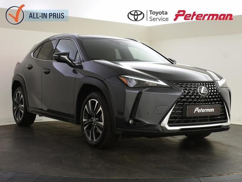 Grijs Gebruikt 2025 Lexus UX 300e Business Edition SUV | € 44.899 - Afbeelding 1/4
