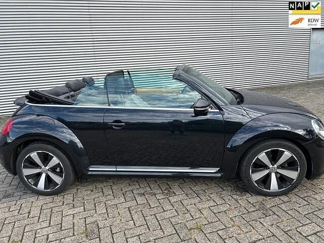 Zwart Gebruikt 2014 VW Beetle Design Cabriolet | € 13.250 (Goede deal) - Afbeelding 1/4