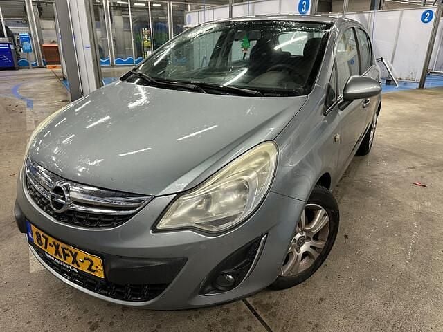 Grijs Gebruikt 2011 Opel Corsa Hatchback | € 1.750 (Goede deal) - Afbeelding 1/4