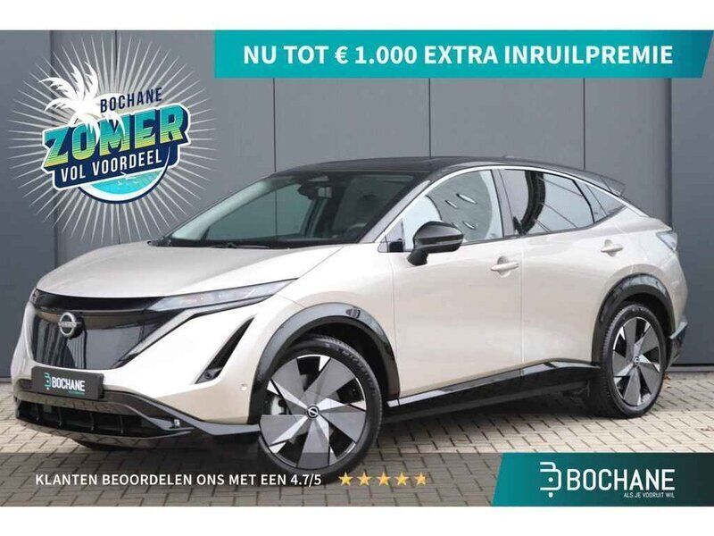 Twotone (warm silver/black) Gebruikt 2024 Nissan Ariya Evolve SUV | € 35.700 (Iets duurder) - Afbeelding 1/4