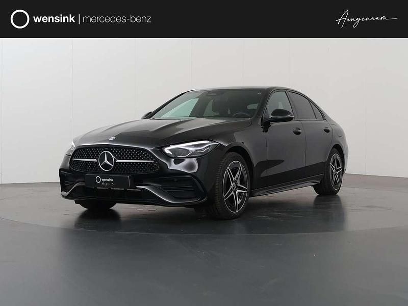 Zwart Gebruikt 2024 Mercedes C300e AMG line Sedan | € 48.850 (Goede deal) - Afbeelding 1/4